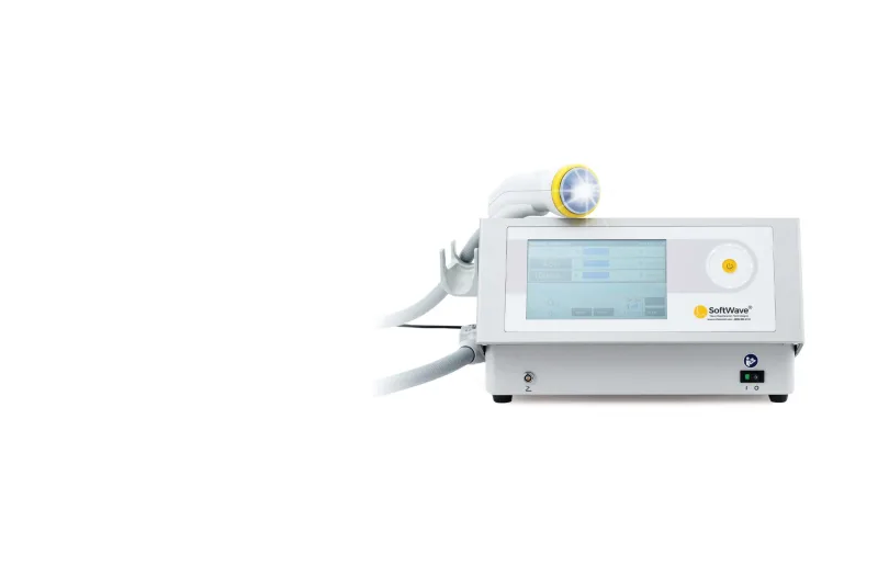 SoftWave TRT device with its touchscreen and yellow-rimmed treatment applicator